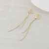 Golden long mosquito coil with tassels, ear clips