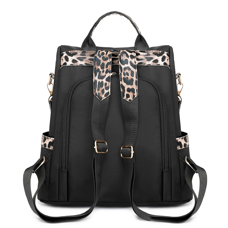 Comercio exterior al por mayor 2025 nuevo estilo antirrobo señoras mochila moda leopardo borla viaje al aire libre mochila de doble uso marea