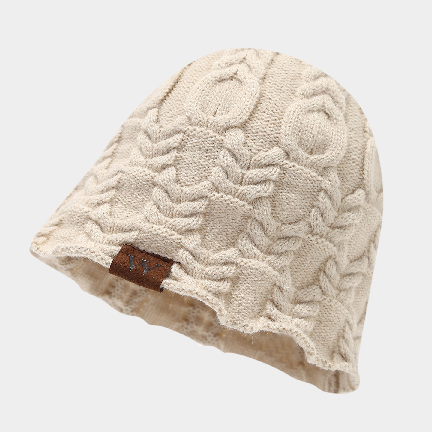 Transfronterizos sombrero de mujer otoño y invierno ocio al aire libre W cuero etiqueta torsión gorra de protector de orejas gorra de punto caliente retro