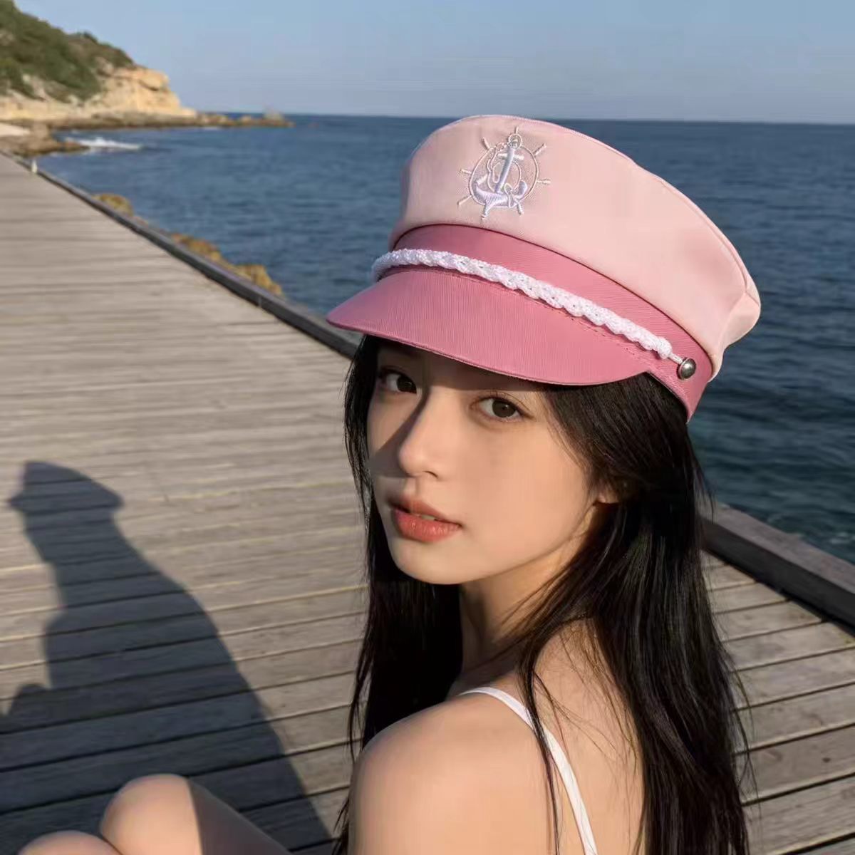 핑크색 원형 로고 선원 모자