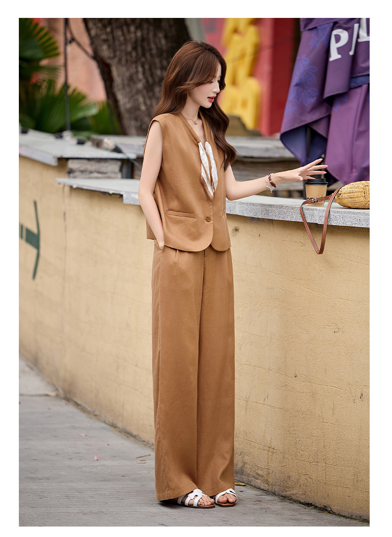 Bộ vest nữ gồm áo gile và quần tây ống đứng cạp cao — màu đen, màu cam, màu trắng ngà chi tiết 16