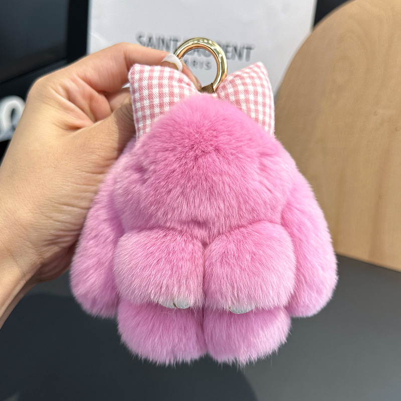 卸売りのかわいいウサギの毛の蝶結びの小さいウサギの自動車のキーホルダーはぬいぐるみのかばんを掛けて飾ります。
