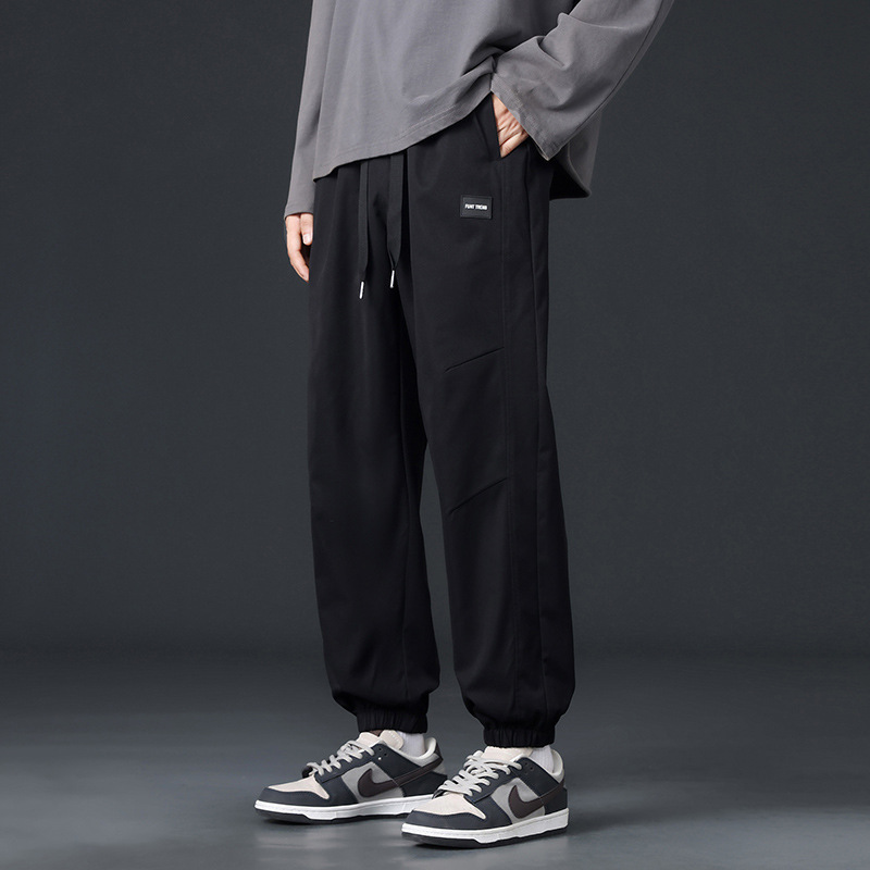 Pantalones de hombre primavera y otoño estilo americano de moda universal suelto y cómodo chaqueta deportiva, pantalones casuales para hombres