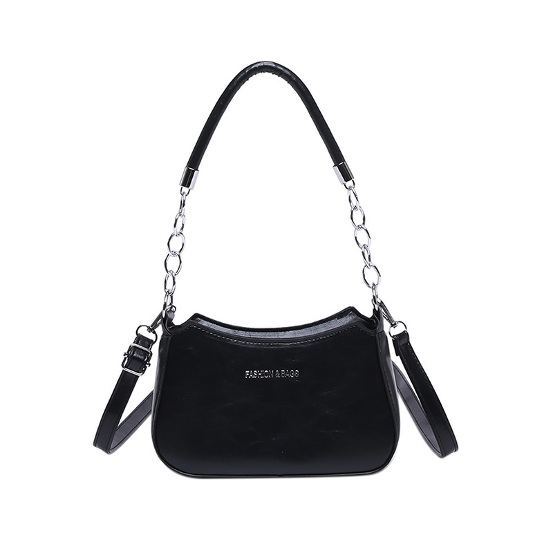 Bolso de mano de cadena de color sólido debajo de la axila para mujeres 2024 nuevo estilo estilo extranjero bolso de hombro de moda textura temperamento mochila casual