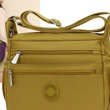 潮流简约通勤包旅行包超轻防水单肩斜挎包户外休闲包妈妈包收款包