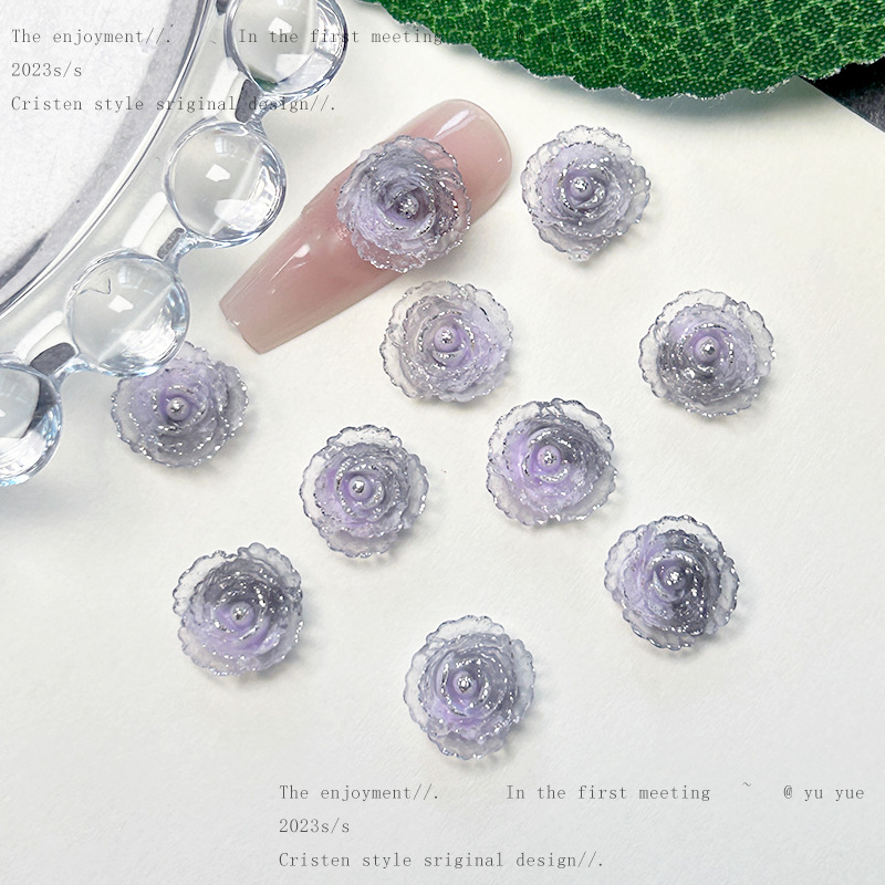 Nueva joyería de uñas de estilo gris-púrpura salvaje de estilo ins mezclada luminosa tridimensional de flores pequeñas accesorios de armadura al por mayor