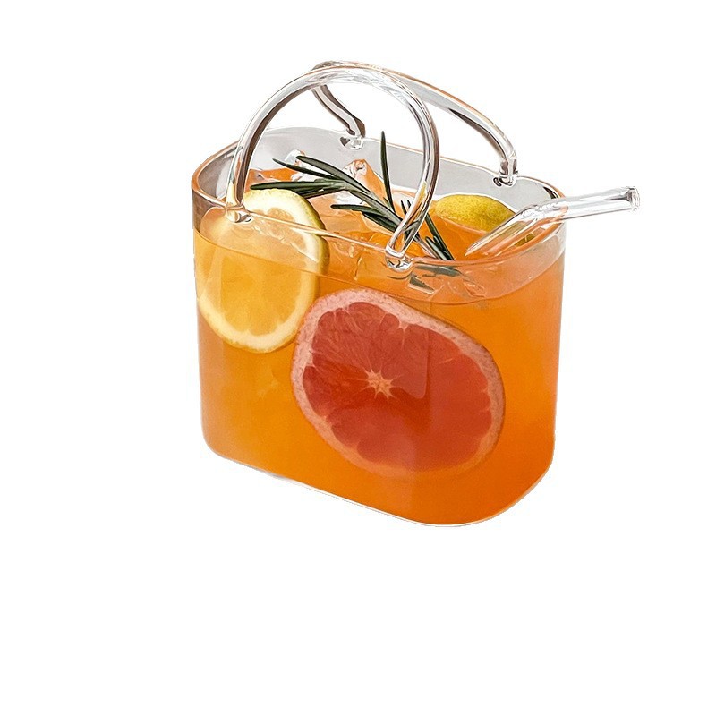 Bolsa de mano de vidrio transfronteriza, taza de té de fruta roja en línea, creativa transparente, extraña, taza de jugo de frutas de alto valor.