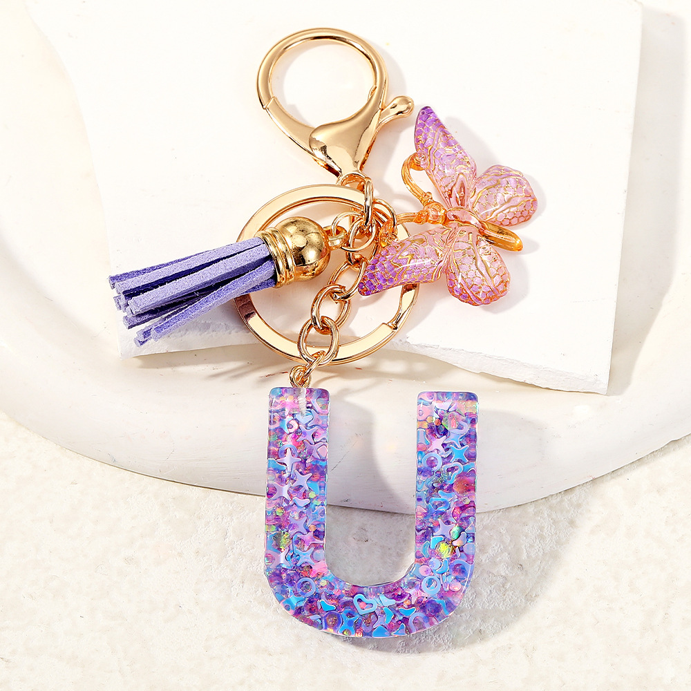 Inglés transfronterizo A-Z resina letras llavero colgante mariposa púrpura bolsos de mujer colgante llavero de automóvil