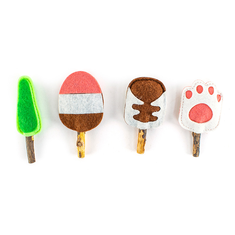 Juguete para mascotas fieltro Polygonum multiflorum posicle gato traje de juguete limpieza gato cavidad oral en stock que contiene catnip