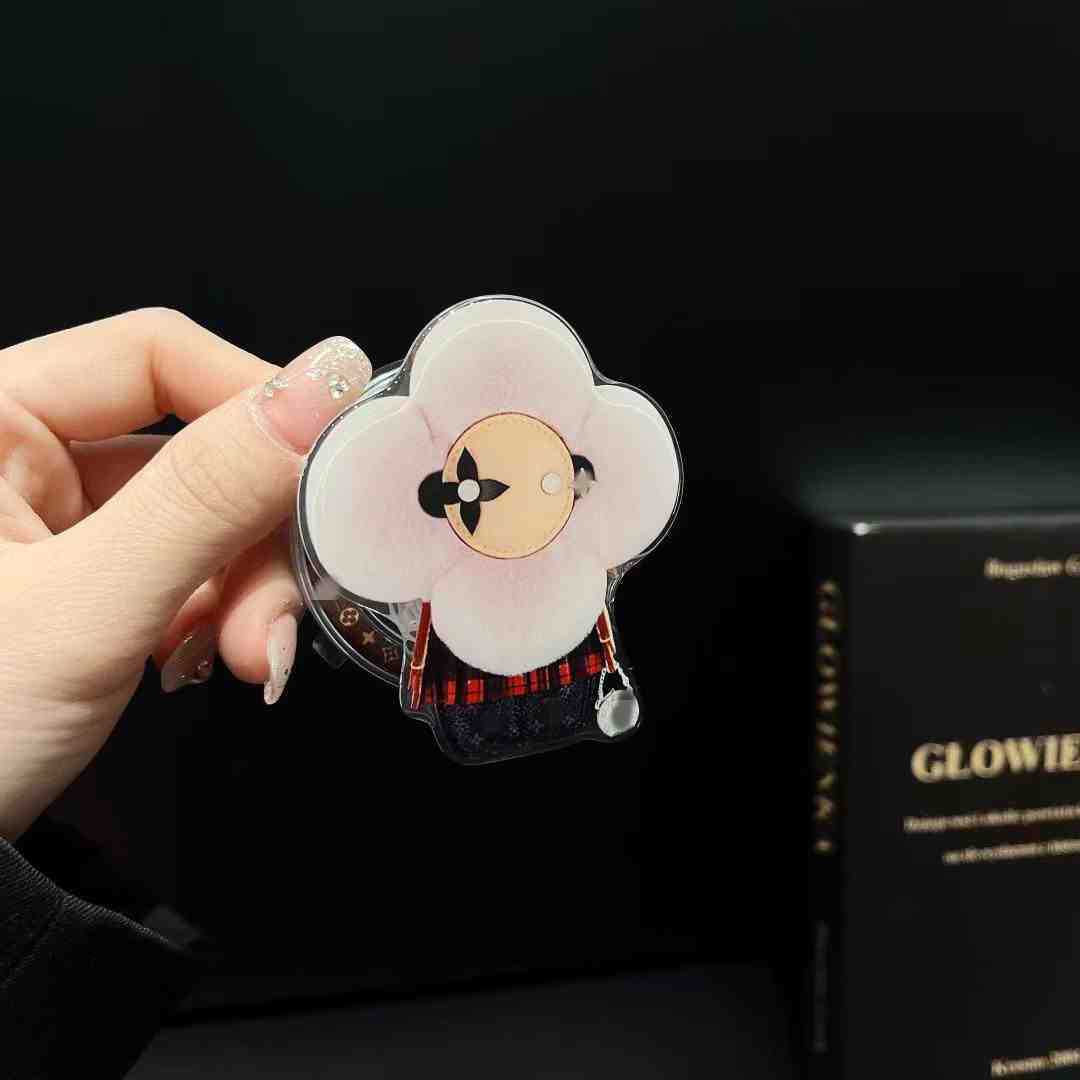 新型高級マグネットスタンドマグネット式携帯ケース通用太陽花マグネット式エアバッグスタンドはおしゃれで豪華です。