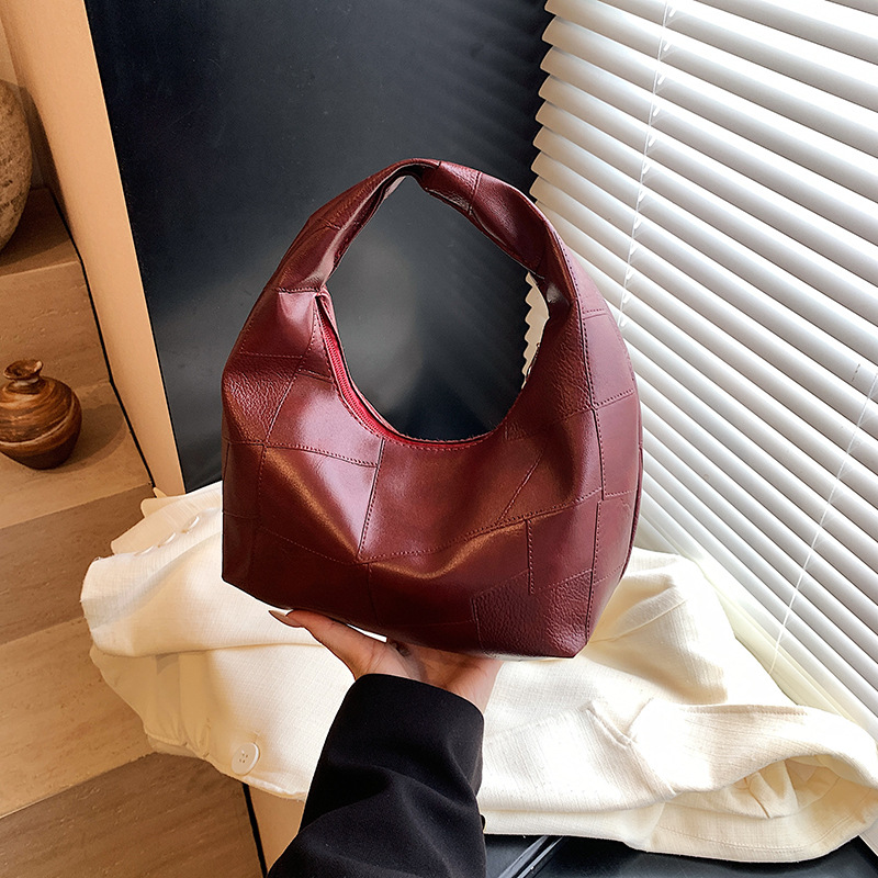 Bolsa de nube estilo minimal pliegue de la axila de la niña pliegue bolsa grande 2025 principios de primavera nuevo bolso de hombro mujer