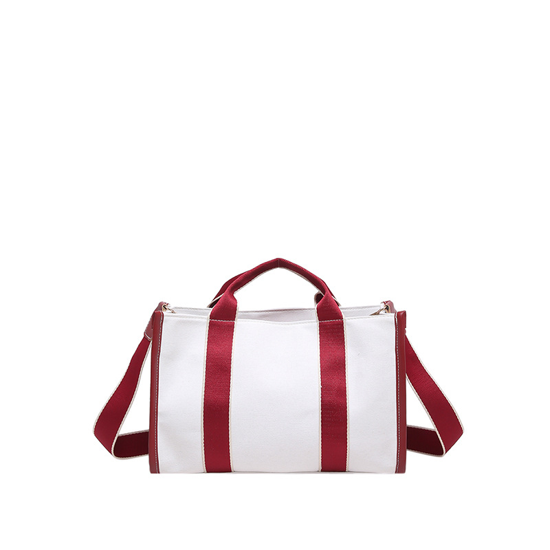 2024 invierno nuevo estilo de moda coreana ins bolso de lona de gran capacidad de viaje bolso de hombro bolso de colisión de color