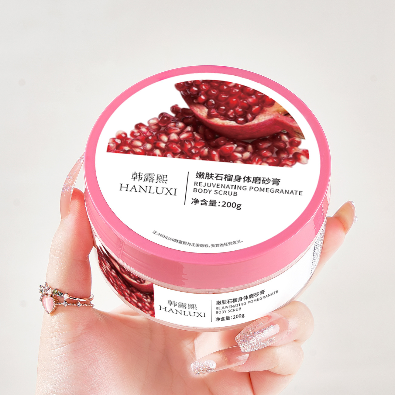Han Luxi fábrica al por mayor granada semilla exfoliante cuerpo loción exfoliante cuerpo entero sal de baño fábrica de cuidado corporal