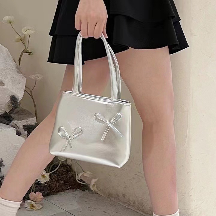 2023 nuevo y2g dulce fresco chica caliente pequeño bolso de plata mini bolso del teléfono arco bolso para las mujeres