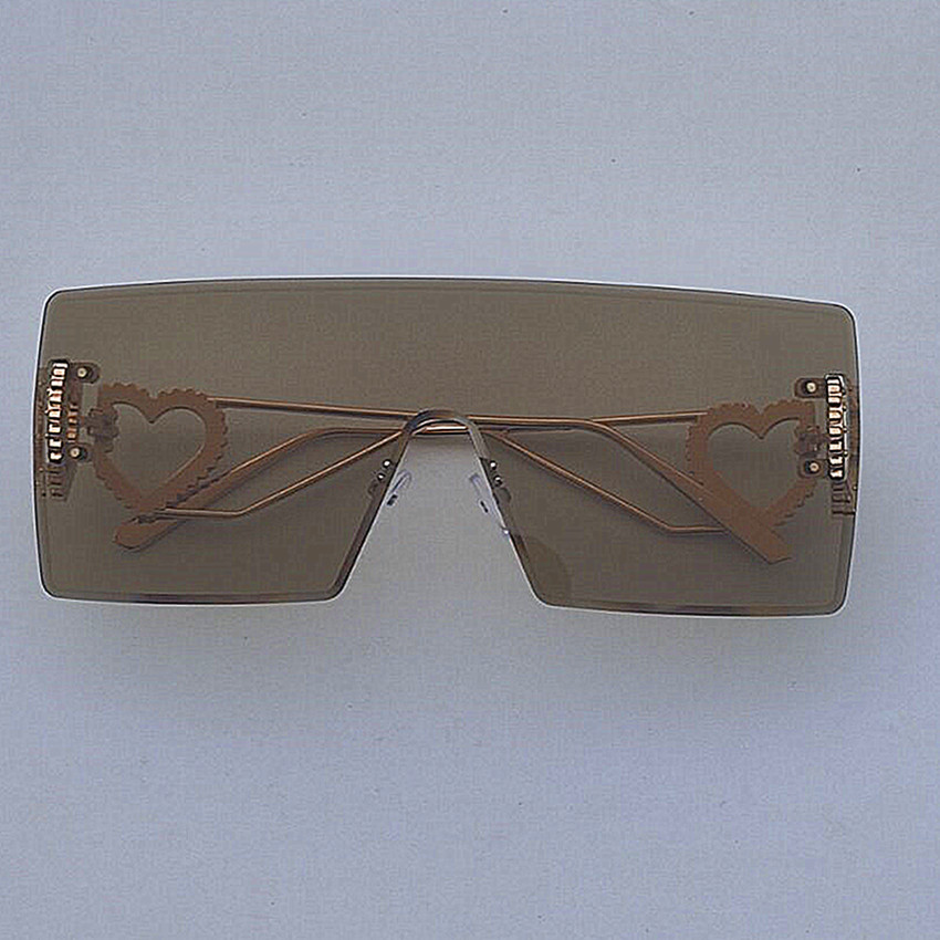Occhiali da sole rotondi rétro da donna con montatura nera moda_voghion.com