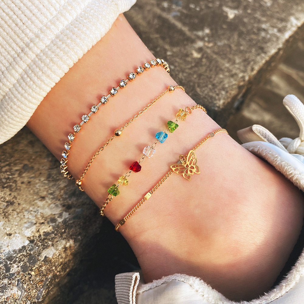 Korean-style Jewelry on AliExpress: Hot-selling 4-Piece Set of Retro Colorful Rhinestone Butterfly Multi-layer Anklets—Perfect Beach Foot Accessories for Europe and America