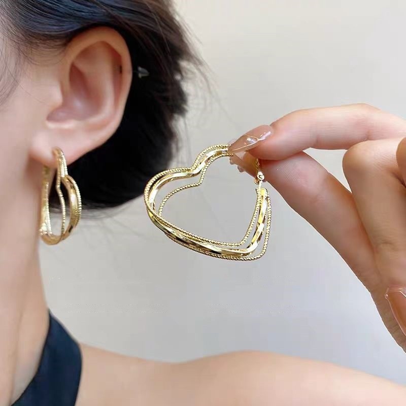 Gold love earrings
