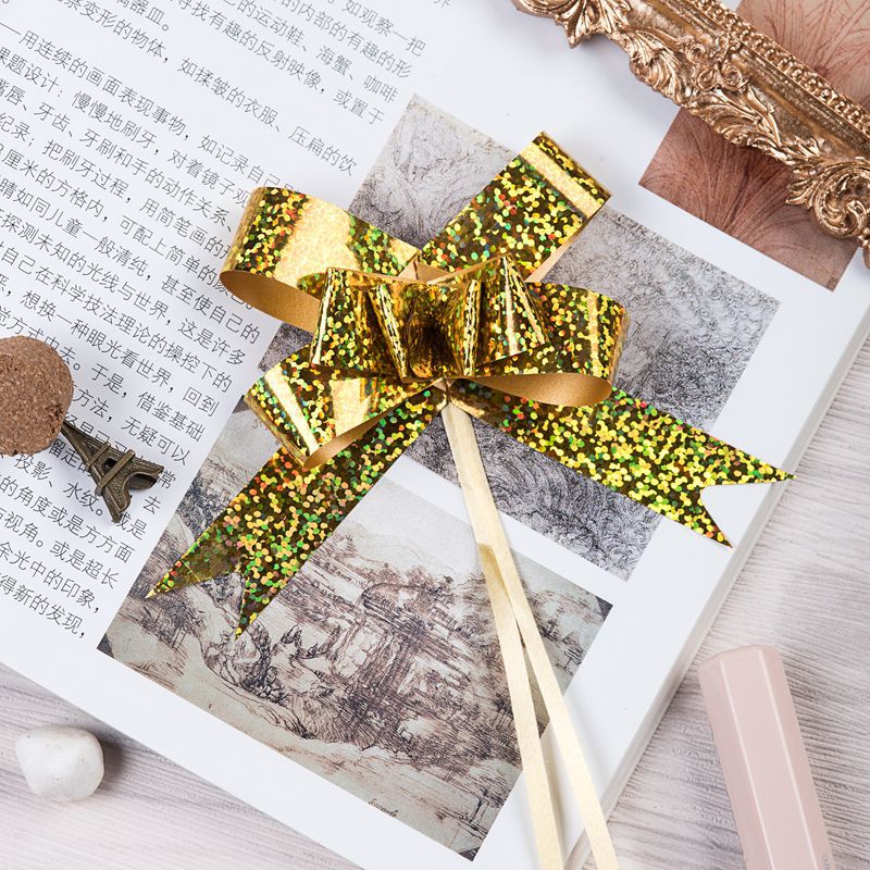 Venta caliente transfronteriza 18mm láser metálico dibujado a mano flor regalo de Navidad embalaje dibujo flor arco tirar flor envío gratuito