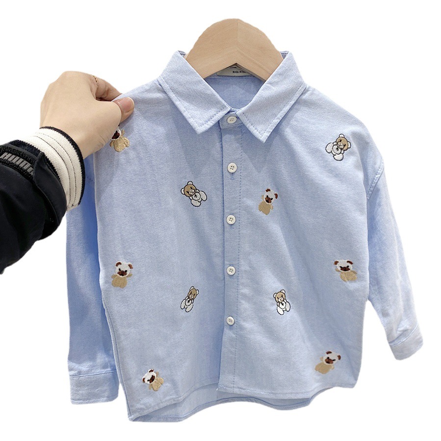 Camisa de manga larga de los niños 2023 primavera nueva camiseta de oso de dibujos animados superior camisa de estilo occidental de los niños de moda