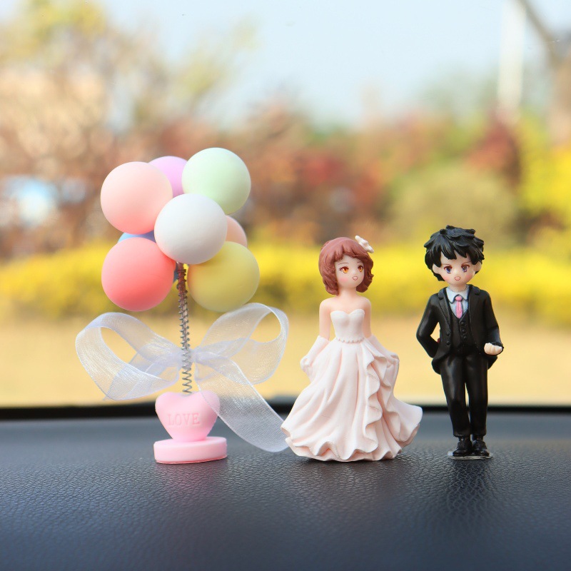 Nuevos accesorios de automóviles consola al por mayor muñecas creativas de dibujos animados accesorios de automóviles decoraciones de boda pareja