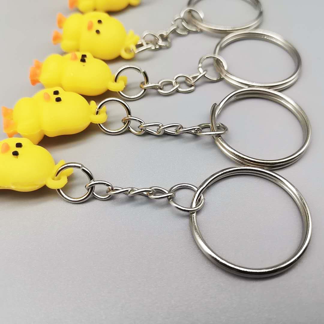 2.5cm mini pato amarillo llavero PVC pegamento suave pato amarillo llavero colgante regalo juguete al por mayor