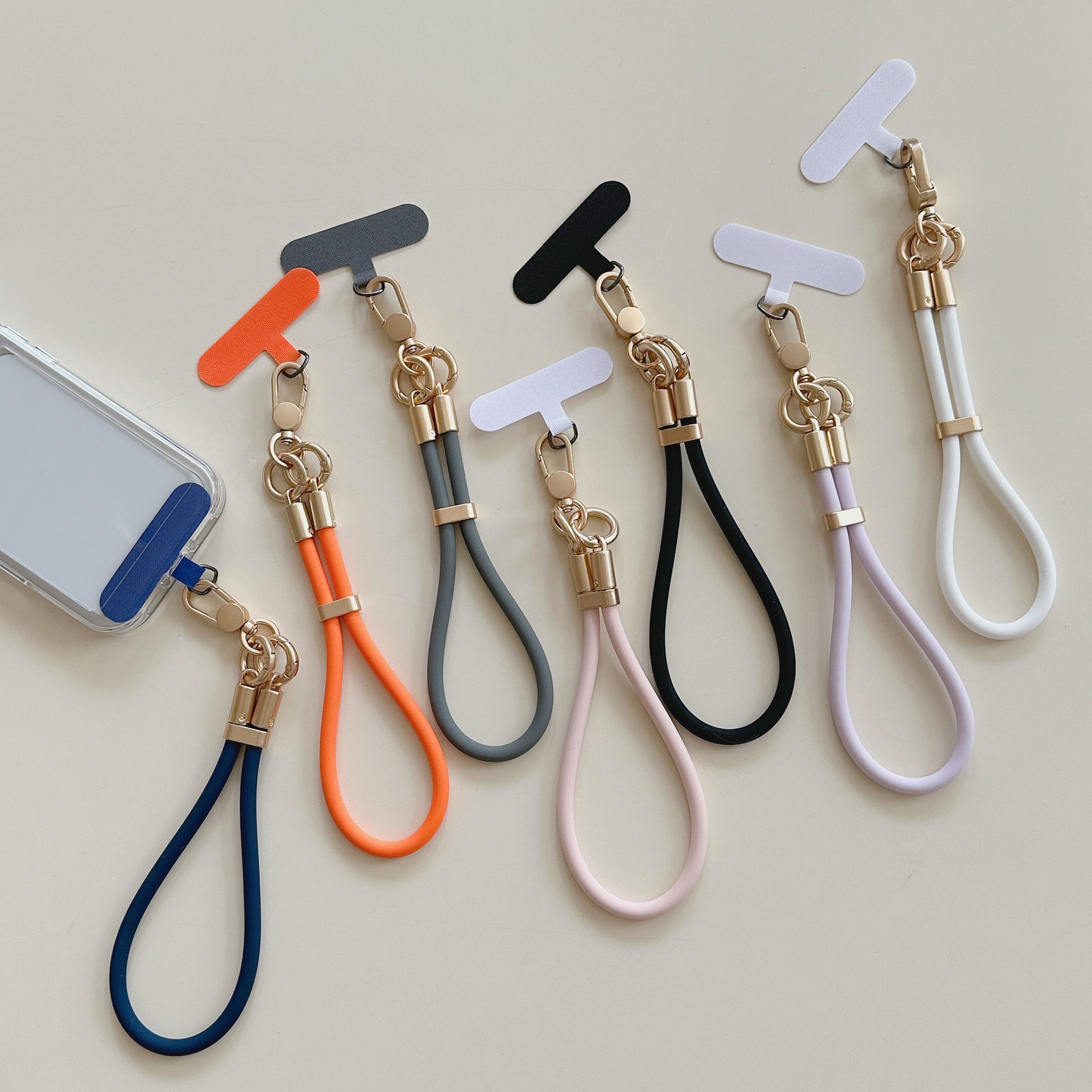 Silicone líquido de color sólido caso de teléfono móvil cuerdas móviles para mujeres pulsera anti-perdida ajustable de alto nivel cuerdas móviles para mujeres