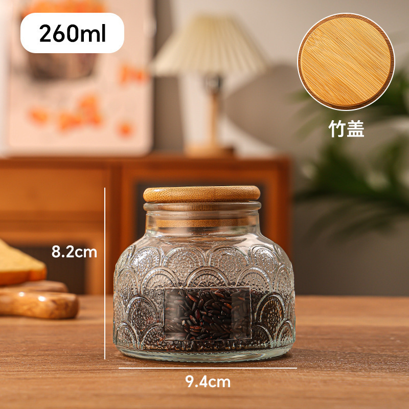 Relieve gran barriga tanque de almacenamiento de vidrio sellado cocina frutas secas granos alimentos almacenamiento al por mayor latas de dulces transparentes