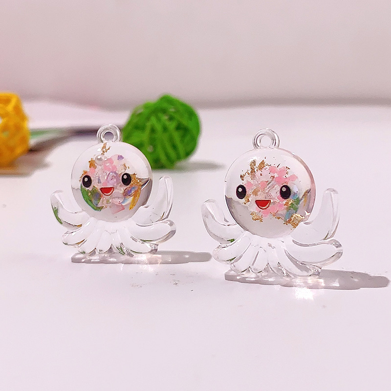Nuevos accesorios de pulpo nocturno marino serie de cristal octopus llavero colgante DIY material pendiente
