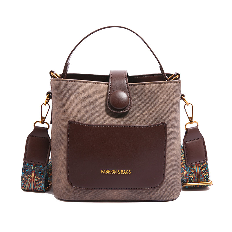 Bolsa de cubo portátil popular de comercio exterior para mujeres 2025 nuevo color de contraste universal bolso de hombro retro moda mochila