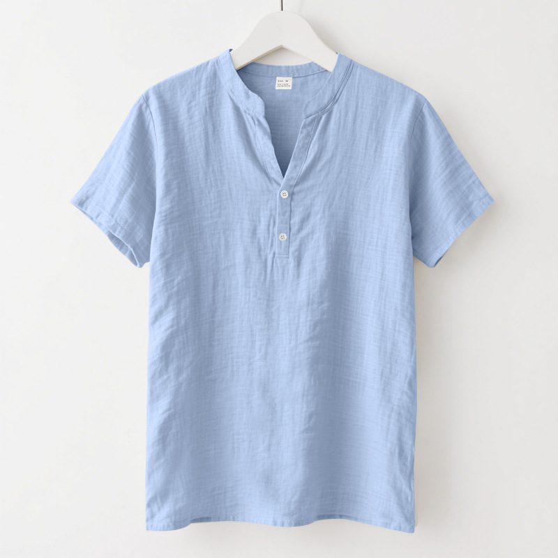 Camisa suelta casual de verano para hombres europeos y americanos, camisa de color sólido de lino de manga corta con cuello alto de moda para hombres