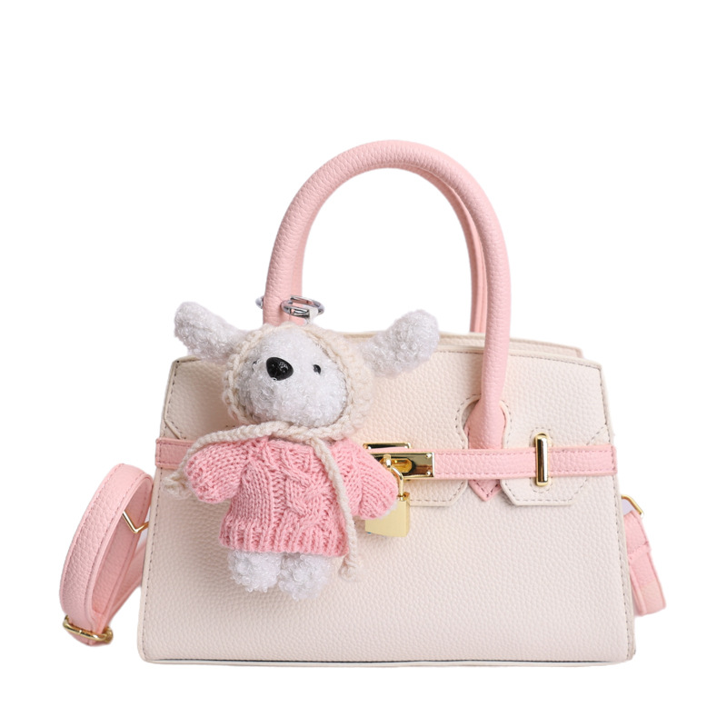 Coreano simple bolso de mano mujer 2026 primavera nueva bolsa de viaje diario texturizada bolso de mochila