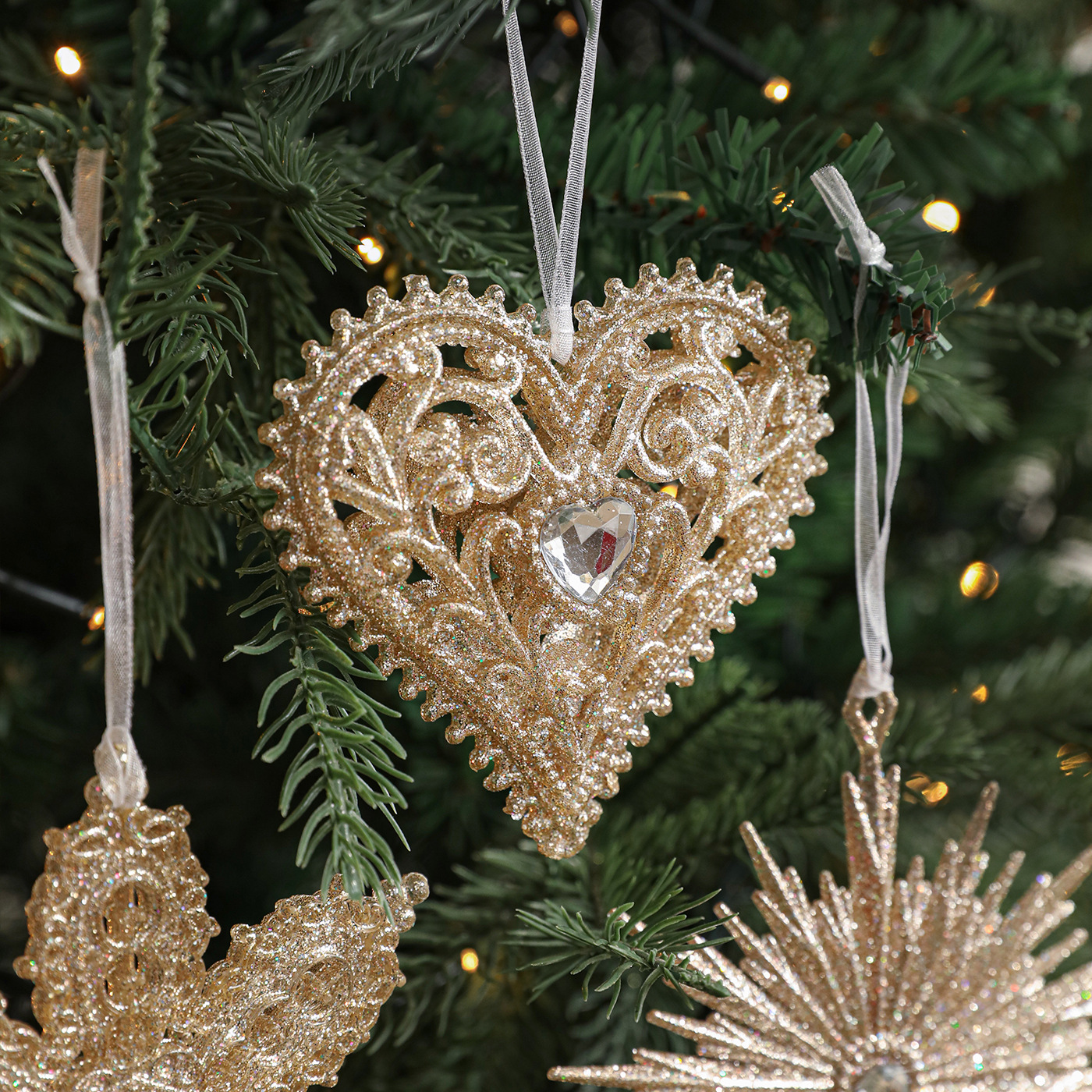 Polvo de champaña transfronterizo polvo de oro colgante retro copo de nieve amor plástico hueco decoración de árbol de Navidad colgante
