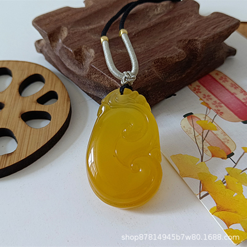 메인 드로잉 로프가있는 황 칼세도니 Ruyi (약 48*30mm)