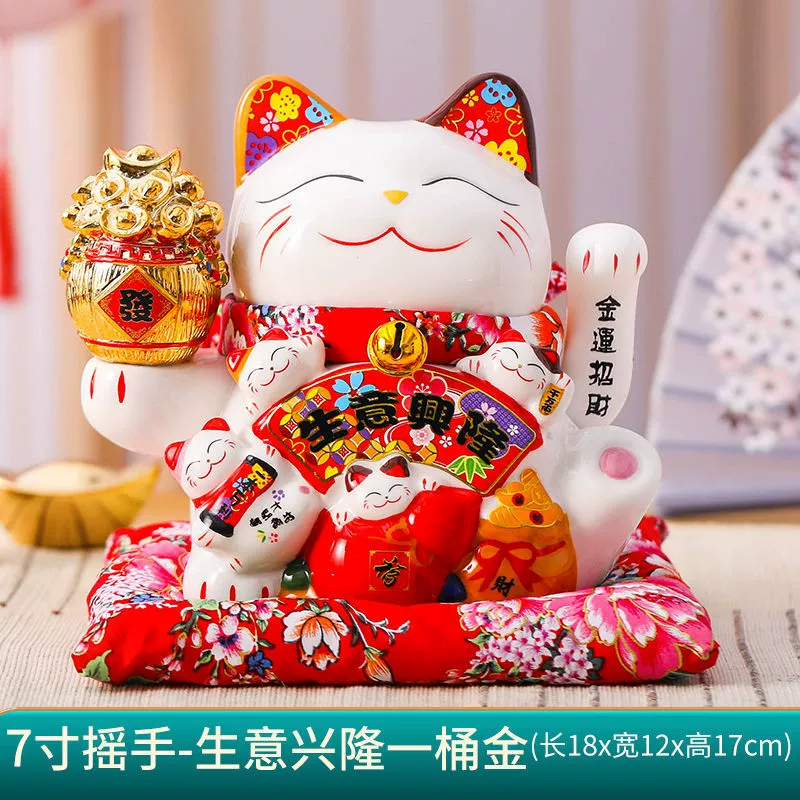 7 -inch wealth cat ornament shakes hands.