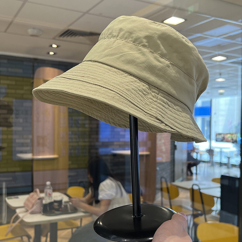 Sombrero de pescador de protección solar para mujeres 2024 nuevo estilo de estilo de moda con bordes anchos y una parte superior plana, sombrero de sol casual universal