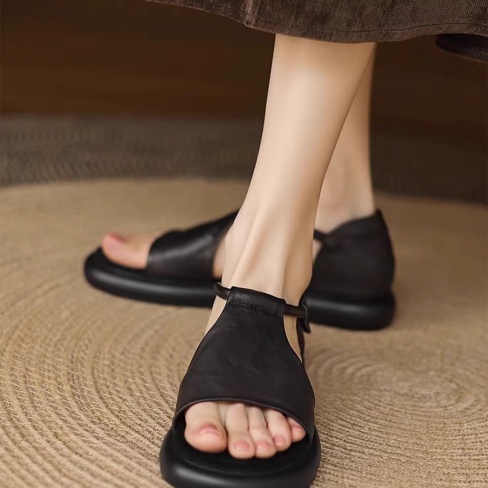 Nicho retrógrado sandalias de dedos desnudos para mujeres de verano 2026 nuevo hueco casual cómodo zapatos romanos planos