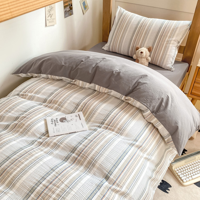 Juego de cama de dormitorio de estudiantes de algodón de tres piezas 2025 nueva funda de edredón de sábana de algodón individual Un juego completo de ropa de cama