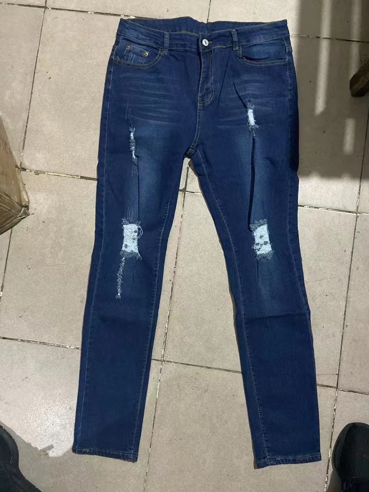 jeans ajustados rasgados de cintura alta en color liso NSGJW137468