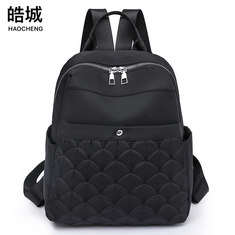 2023 primavera nuevo estilo casual damas mochila de nailon moda simple de gran capacidad bordado mochila de viaje al por mayor