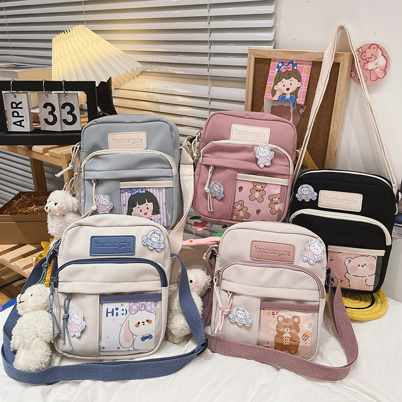 Bag female Japanese fresh soft sister student shoulder bag female cartoon cute nylon splash waterproof transparent crossbody bag