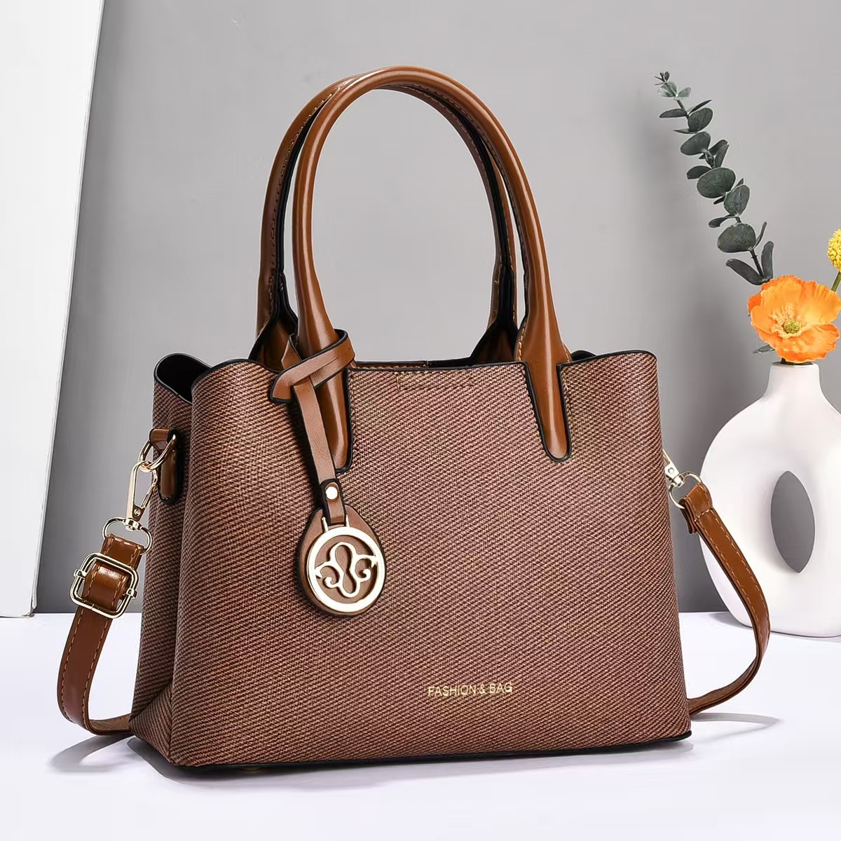 Bolso de mano universal nuevo bolso de hombro de moda bolso de mediana edad bolso de madre bolso de transporte casual bolso de mano