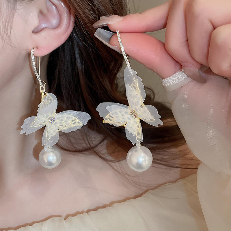 Pendientes de malla de pétalo de dopamina Pendientes de estilo de vacaciones junto al mar de estilo nuevo estilo caliente Pendientes de temperamento exagerado de todo fósforo al por mayor