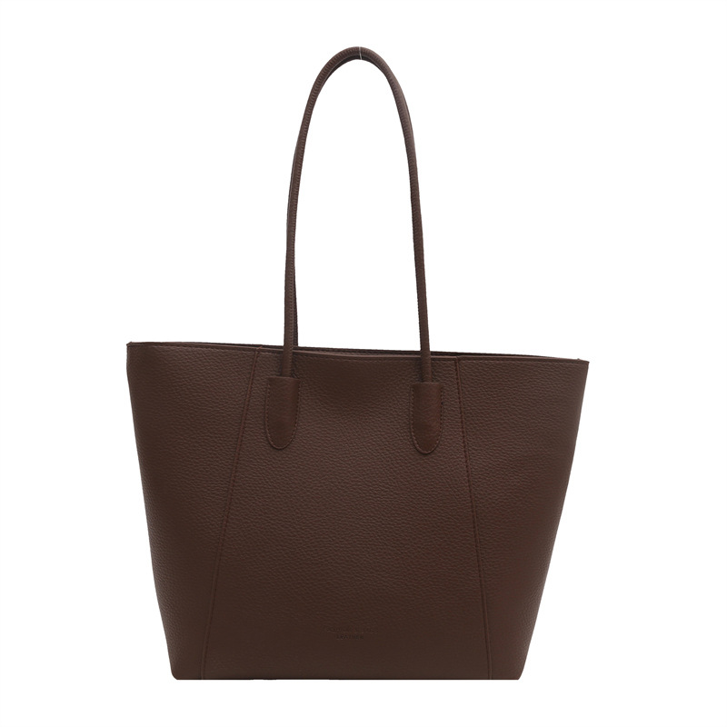 Bolsa de cubo retro de gran capacidad de superficie suave 2024 nueva moda de color sólido de viento relajado de viaje simple de hombro bolsa