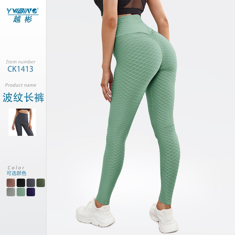 ¡En stock! Europa y América popular melocotón hip lifting onda patrón jacquard yoga burbuja pantalones de cintura alta medias deportivas para las mujeres