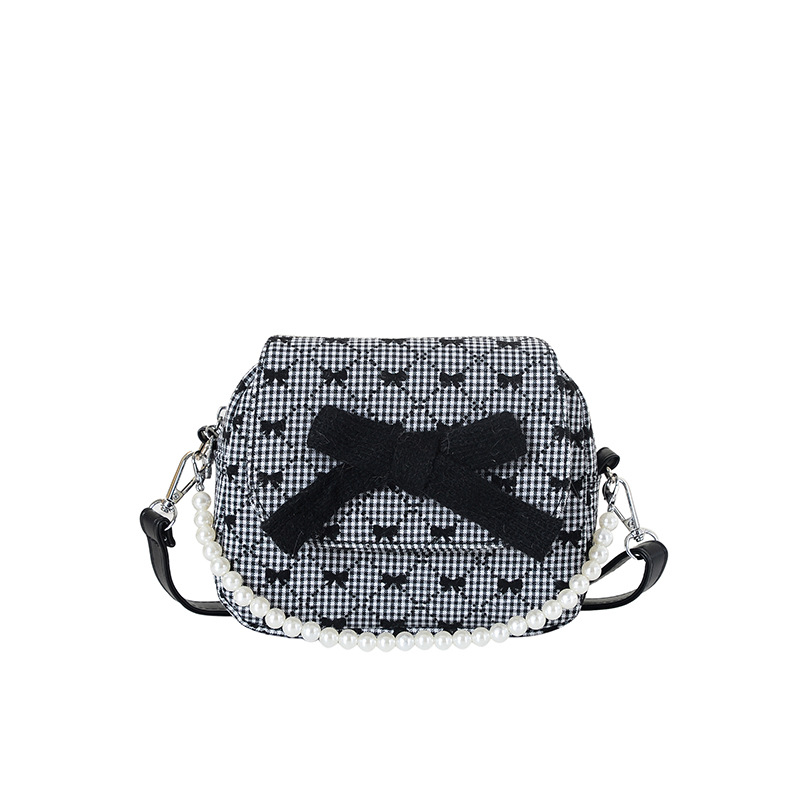 Arco encantador extranjero, bolso de hombro de niña, bolso de perla de diamante de moda, nuevo bolso de cambio para niños.