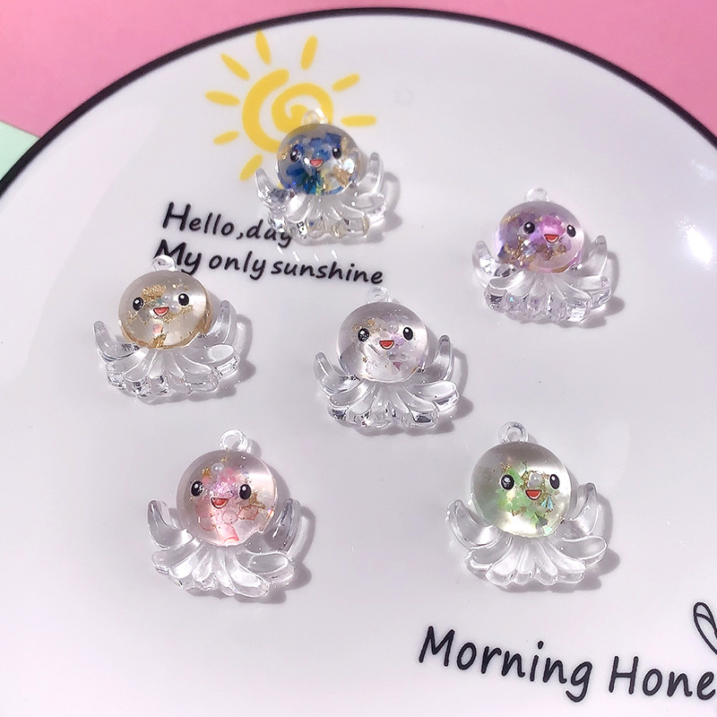 Nuevos accesorios de pulpo nocturno marino serie de cristal octopus llavero colgante DIY material pendiente