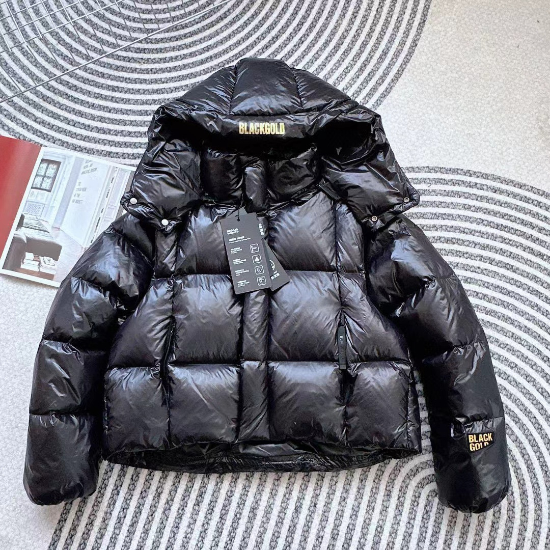 Chaqueta corta de plumón de oro negro para mujer 2025 nuevo estilo invierno plumón de ganso blanco manga extraíble diseño sensación suelta chaqueta gruesa