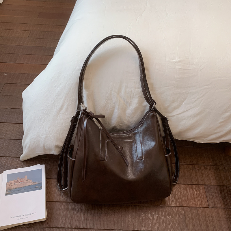 Bolsas transfronterizas de gran capacidad para mujeres 2026 retro nicho mochila de hombro de viaje ocio mochila tote
