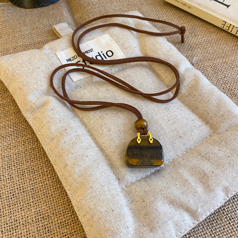 Nuevo estilo de cuero chino, colgante, collar de borlas, estilo étnico femenino, cadena de suéter retro de nicho, moda, artículos de alta gama