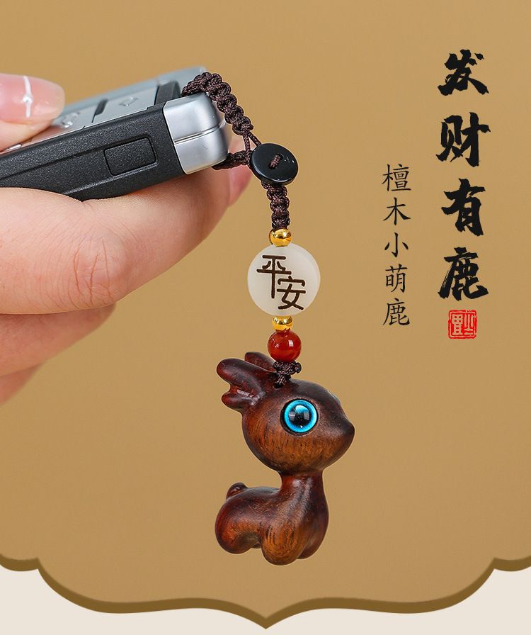 A deer car key chain pendant sandalwood deer buckle key car decoration deer couple pendant